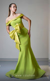 MNM Couture V07546 off-shoulder mermaid gown with a dramatic bow.