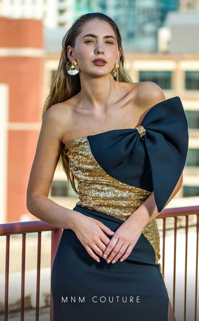 MNM Couture V07567 black and gold rayon crepe column dress with floral embellishments and square neckline.| Couture Shop LA