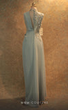 GLAM by MNM Couture V6457 grey column gown with high neckline and knee slit | Couture Shop LA