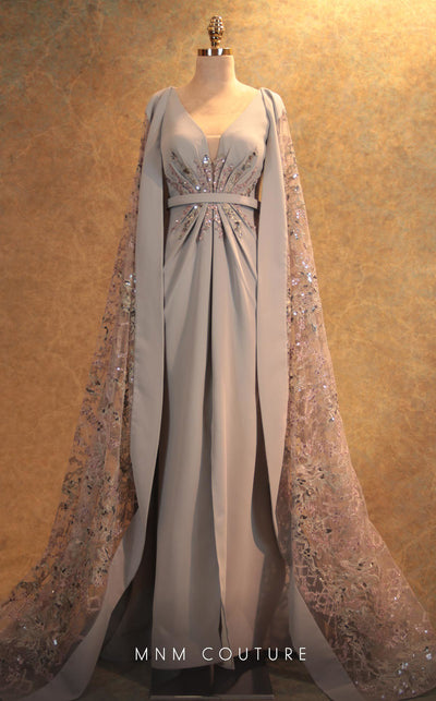 GLAM by MNM Couture V6463 grey gown with embroidered cape sleeves and pleated bodice | Couture Shop LA