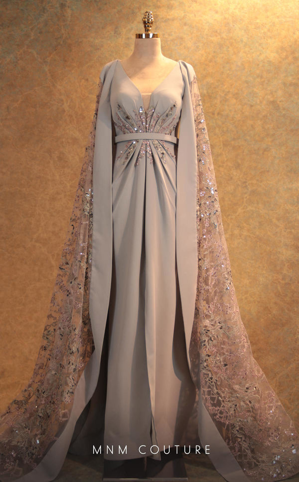 GLAM by MNM Couture V6463 grey gown with embroidered cape sleeves and pleated bodice | Couture Shop LA