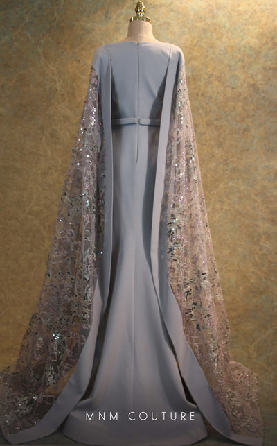 GLAM by MNM Couture V6463 grey gown with embroidered cape sleeves and pleated bodice | Couture Shop LA
