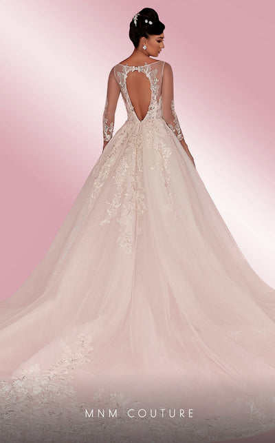 MNM Couture W2104 princess gown with lace applique-trimmed tulle layers and sheer sleeves. | Couture Shop LA