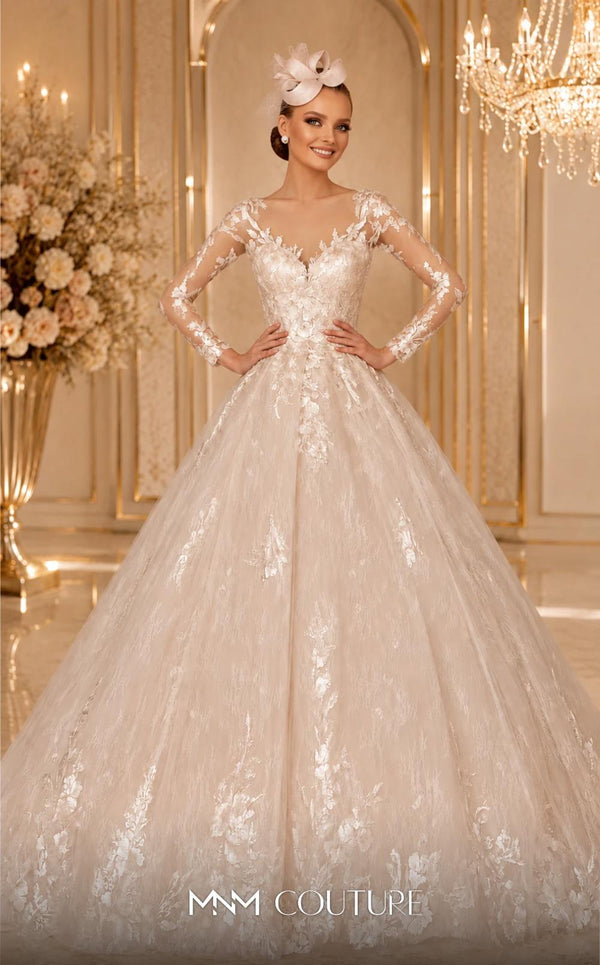 MNM Couture W2106 princess gown with sheer sleeves, lace overlays, and intricate beaded details. | Couture Shop LA