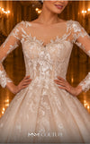 MNM Couture W2106 princess gown with sheer sleeves, lace overlays, and intricate beaded details. | Couture Shop LA