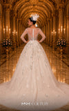 MNM Couture W2116 princess gown with 3D lace flowers, tulle layers, and intricate beaded sleeves. | Couture Shop LA