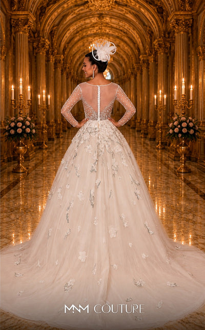 MNM Couture W2116 princess gown with 3D lace flowers, tulle layers, and intricate beaded sleeves. | Couture Shop LA