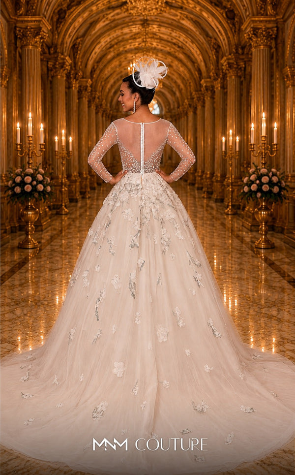 MNM Couture W2116 princess gown with 3D lace flowers, tulle layers, and intricate beaded sleeves. | Couture Shop LA