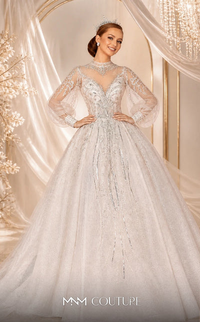 MNM Couture W2117 princess gown with puffed sleeves, shiny tulle, and beaded accents. | Couture Shop LA