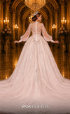 MNM Couture W2117 princess gown with puffed sleeves, shiny tulle, and beaded accents. | Couture Shop LA