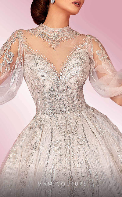 MNM Couture W2117 princess gown with puffed sleeves, shiny tulle, and beaded accents. | Couture Shop LA