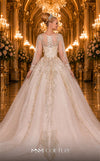 MNM Couture W2123 corset princess gown with embroidered tulle, beadwork, and long airy sleeves. | Couture Shop LA