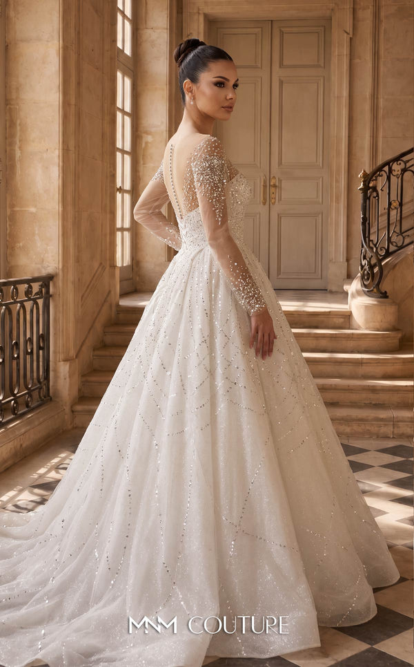 MNM Couture W2310 white ball gown wedding dress with rounded illusion bateau neckline, long sheer sleeves scattered with pearls and crystals, ultra-dense beaded sweetheart bodice, crystal button and corset lace-up back with ribbon bow, and shimmer tulle skirt with cathedral train | Couture Shop LA