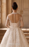 MNM Couture W2311 white ball gown wedding dress with high illusion collar and deep V front, long crystal and pearl-beaded lace sleeves with pearl button cuffs, large oval open back with ribbon bow, and front-open lace overskirt with cathedral train | Couture Shop LA