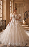 MNM Couture W2324 nude ivory off-shoulder ball gown wedding dress with short puffed flutter sleeves, illusion sweetheart neckline, dense 3D floral lace appliqués, corset lace-up back, and voluminous tulle skirt with cathedral train | Couture Shop LA