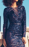 MNM Couture N0378 long-sleeved gown with abstract embroidery and dramatic draped train detail. | Couture Shop LA